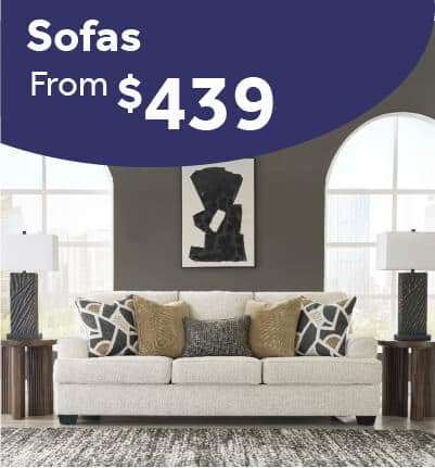 Heartcort Quartz sofa with soft upholstery and accent pillows in a modern living room.